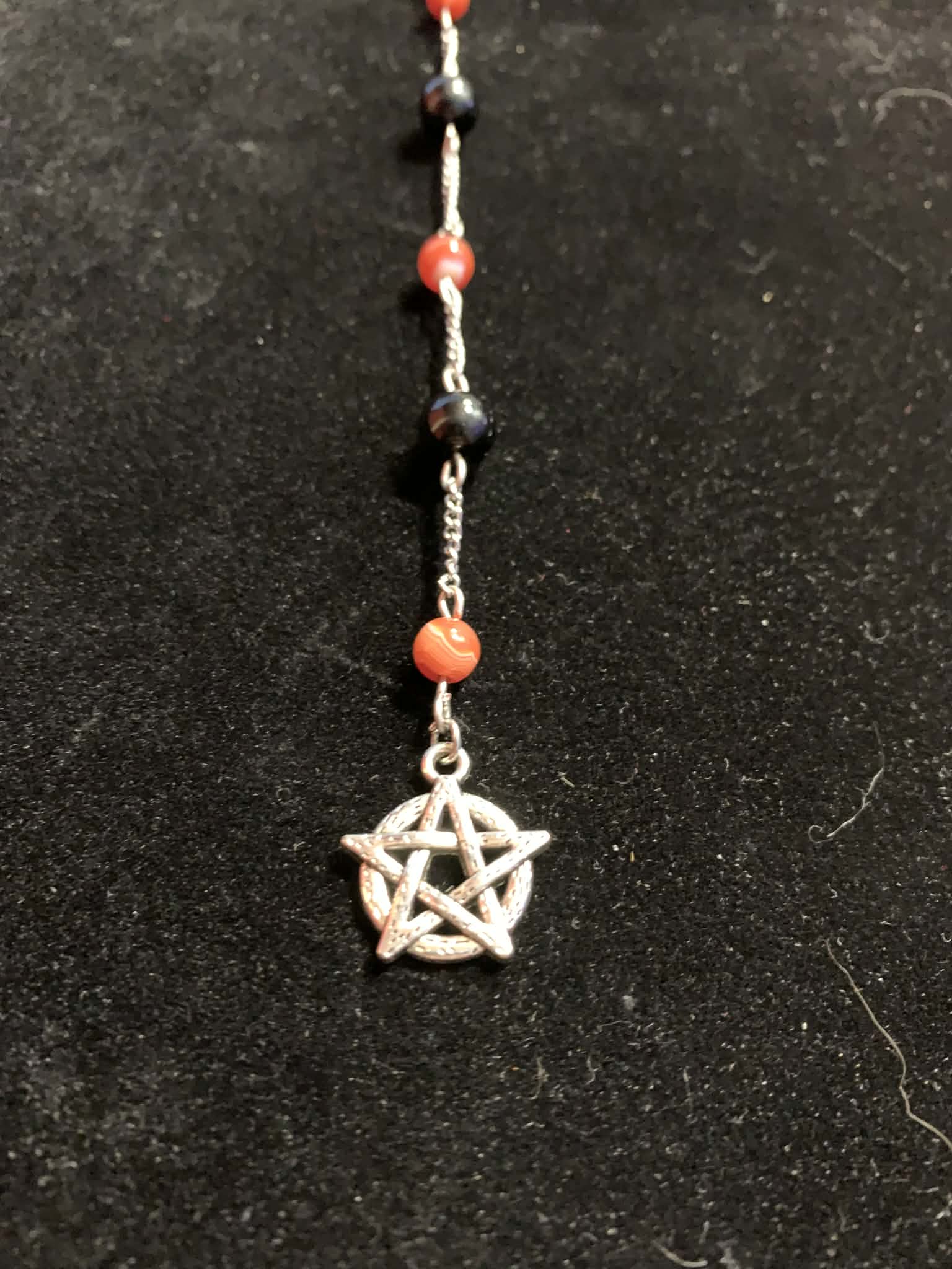 Red and Black Pentacle Hair Twist